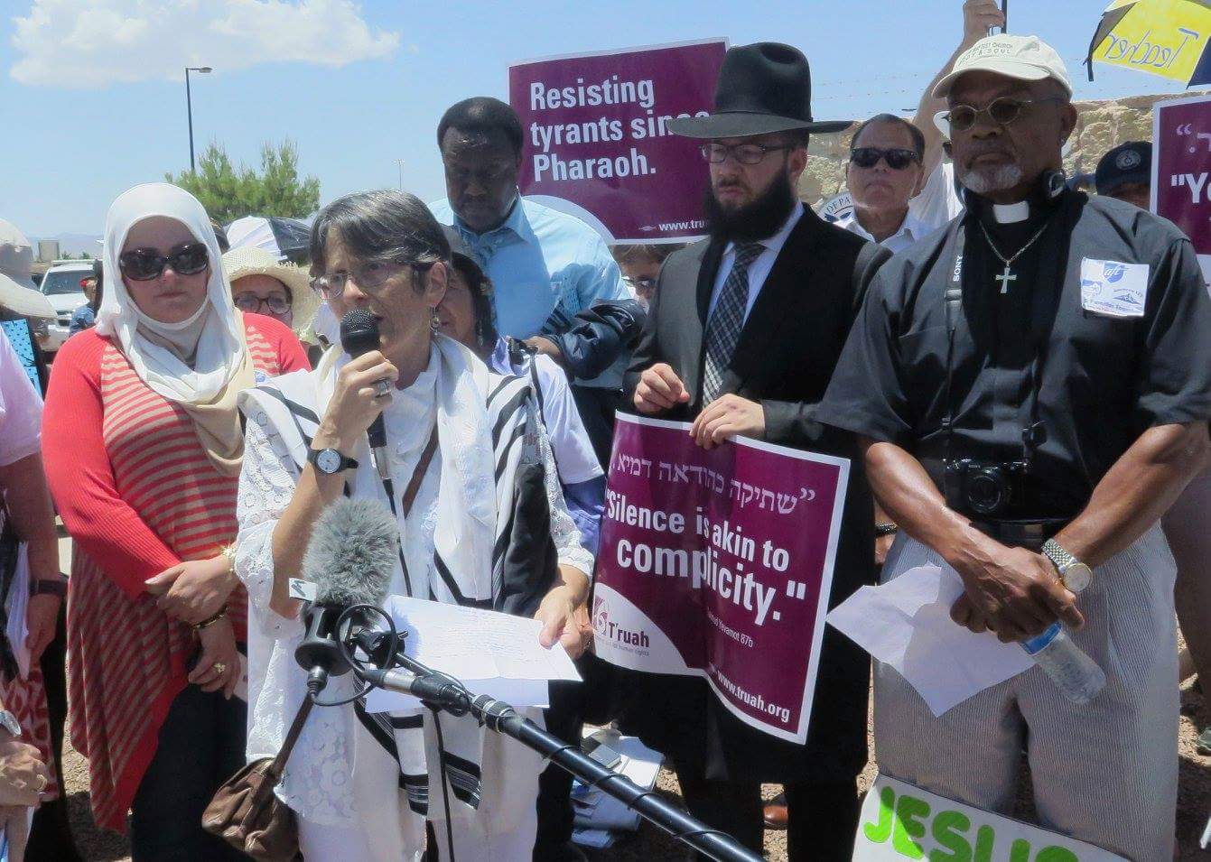 Sharon Cohen Anisfeld with interfaith leaders at TX detention camp