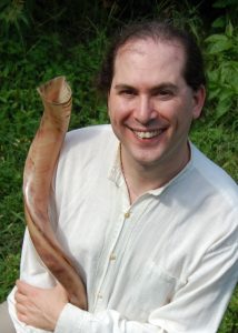 Josh Schreiber holding the shofar