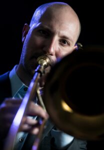 man playing trombone