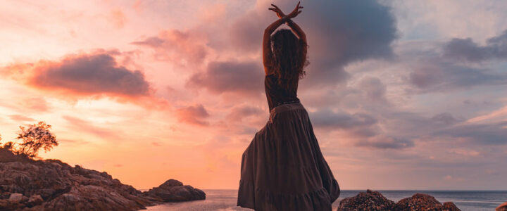 woman dancing on rocks