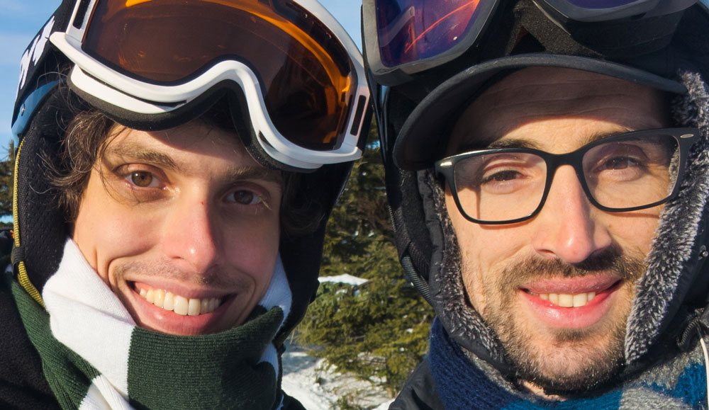 two men in ski clothes smiling